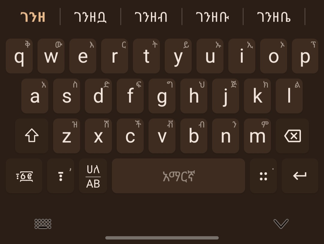 Tana Keyboard showing the full Amharic Fidel layout with Latin key hints